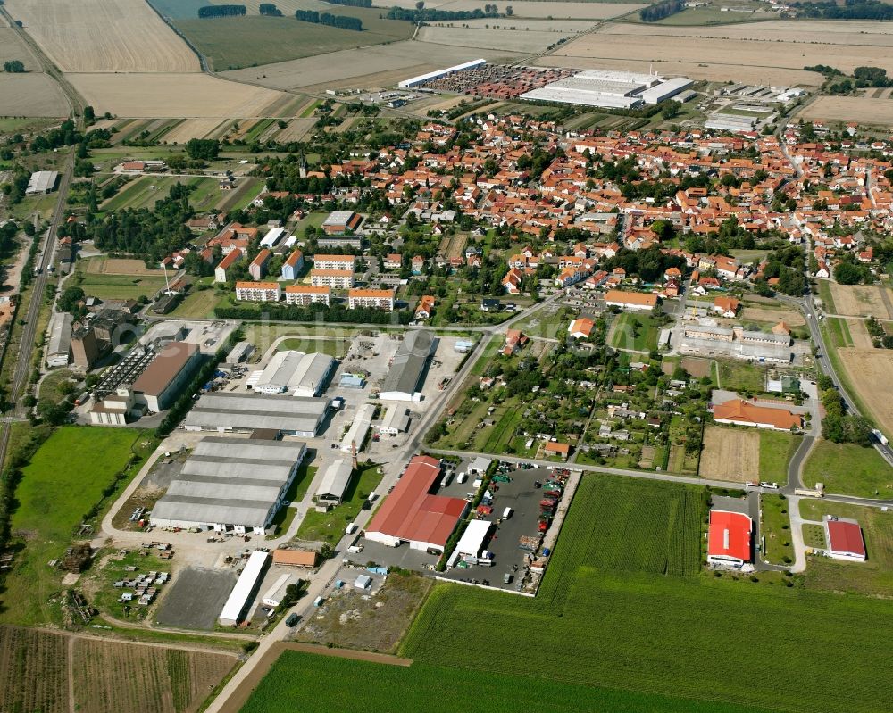 Großengottern from the bird's eye view: Village view on the edge of agricultural fields and land in Großengottern in the state Thuringia, Germany