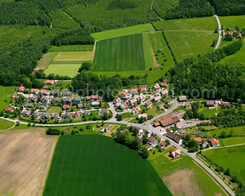 Gutenzell from above - Village view on the edge of agricultural fields and land in Gutenzell in the state Baden-Wuerttemberg, Germany