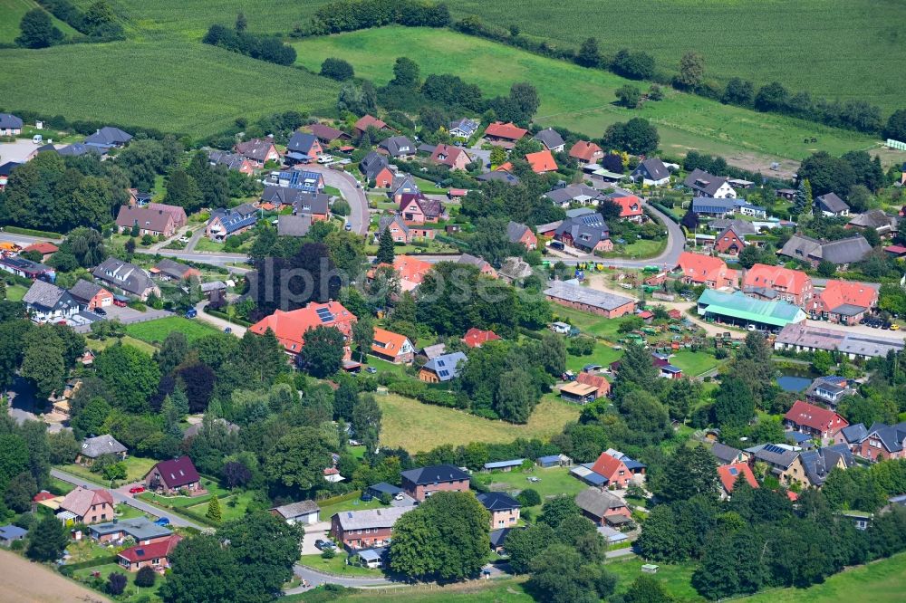 Aerial image Haby - Village view on the edge of agricultural fields and land in Haby in the state Schleswig-Holstein, Germany