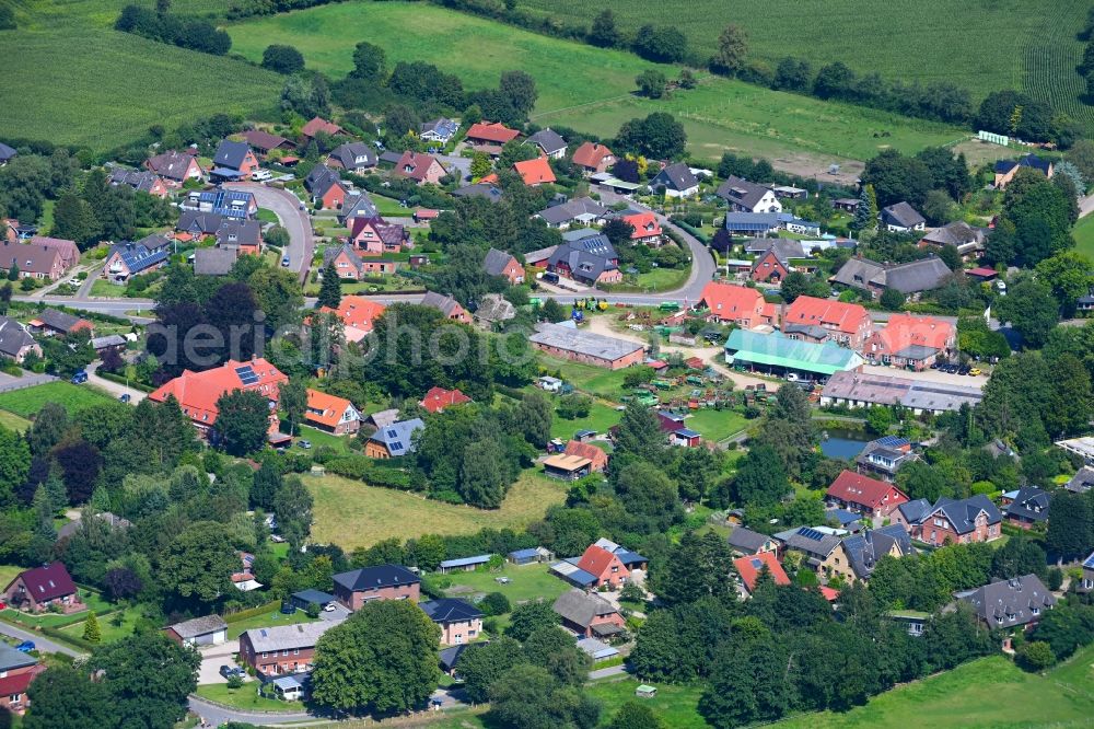 Aerial photograph Haby - Village view on the edge of agricultural fields and land in Haby in the state Schleswig-Holstein, Germany