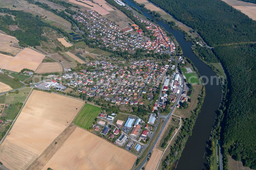 Hafenlohr from above - Village view on the edge of agricultural fields and land in Hafenlohr in the state Bavaria, Germany