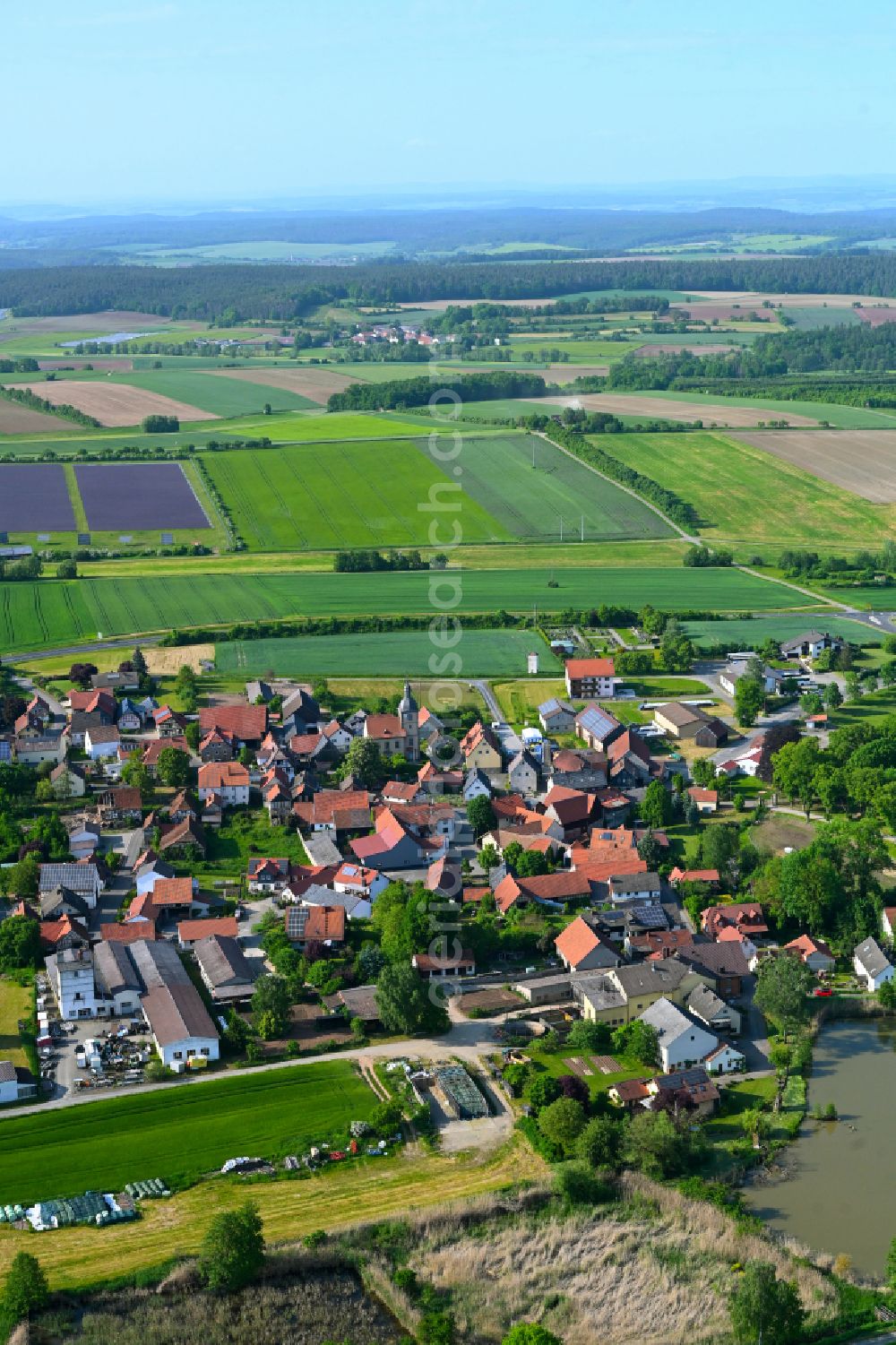 Aerial photograph Hafenpreppach - Village view on the edge of agricultural fields and land in Hafenpreppach in the state Bavaria, Germany