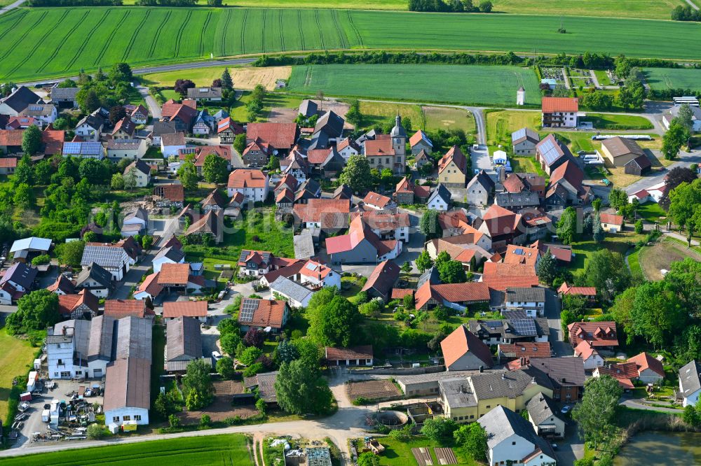 Hafenpreppach from above - Village view on the edge of agricultural fields and land in Hafenpreppach in the state Bavaria, Germany