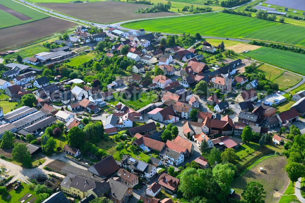 Hafenpreppach from the bird's eye view: Village view on the edge of agricultural fields and land in Hafenpreppach in the state Bavaria, Germany