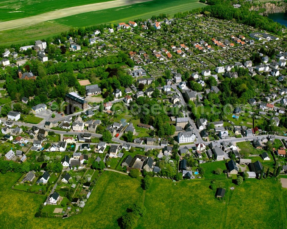 Aerial image Hartmannsdorf - Village view on the edge of agricultural fields and land in Hartmannsdorf in the state Saxony, Germany