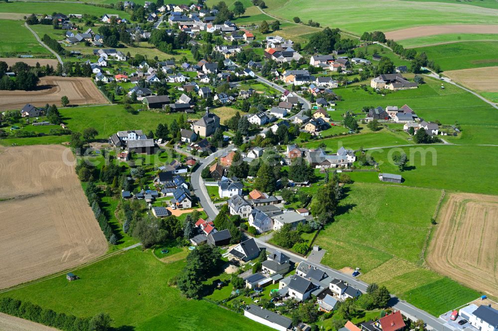 Aerial image Hartmannsgrün - Village view on the edge of agricultural fields and land in Hartmannsgrün in the state Saxony, Germany