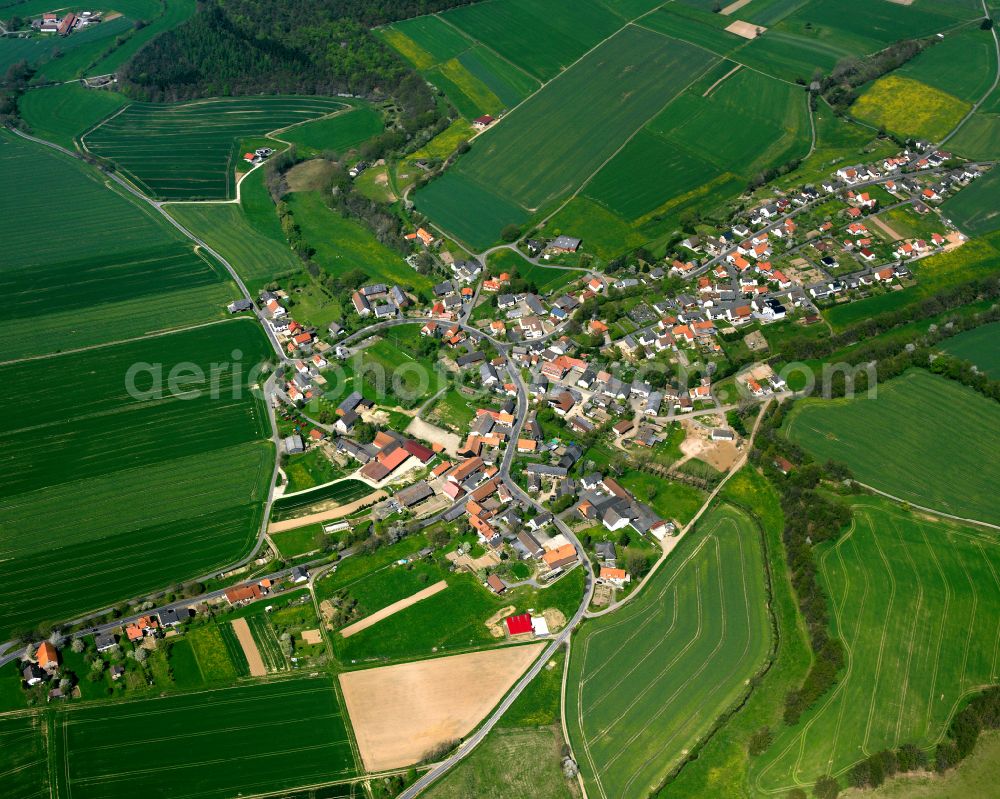 Hattendorf from above - Village view on the edge of agricultural fields and land in Hattendorf in the state Hesse, Germany