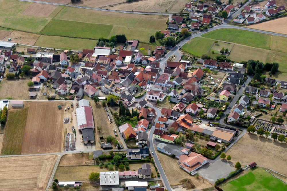 Hausen from above - Village view on the edge of agricultural fields and land in Hausen in the state Bavaria, Germany