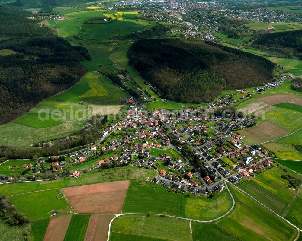 Aerial photograph Heenes - Village view on the edge of agricultural fields and land in Heenes in the state Hesse, Germany