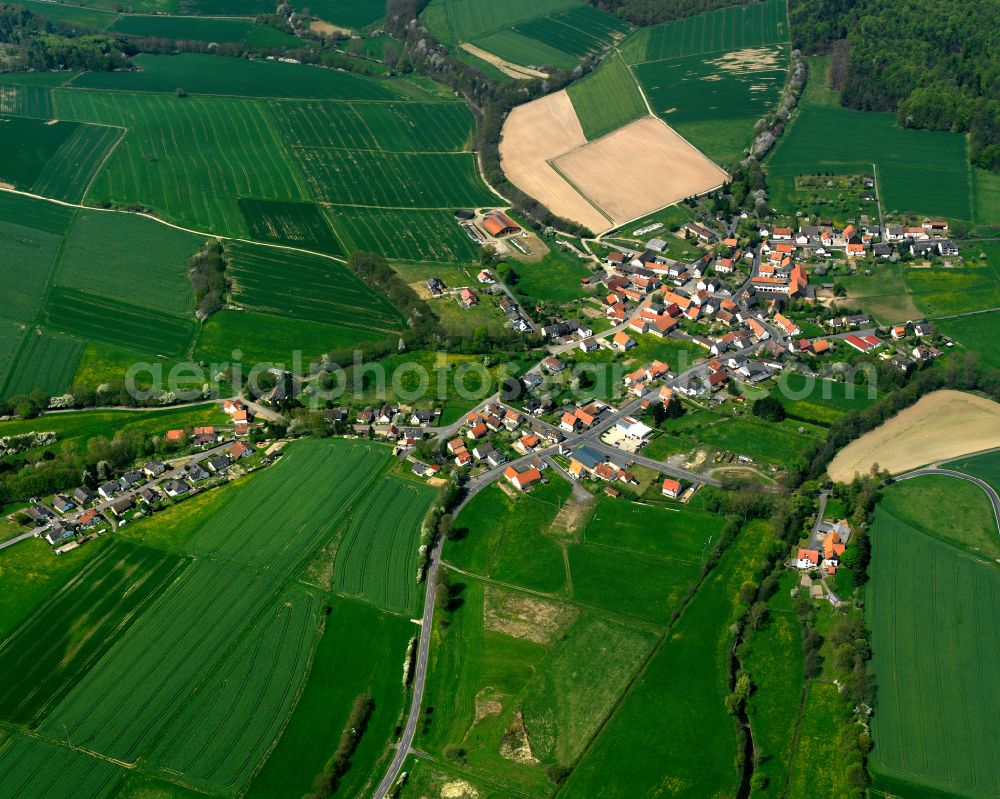 Heidelbach from above - Village view on the edge of agricultural fields and land in Heidelbach in the state Hesse, Germany