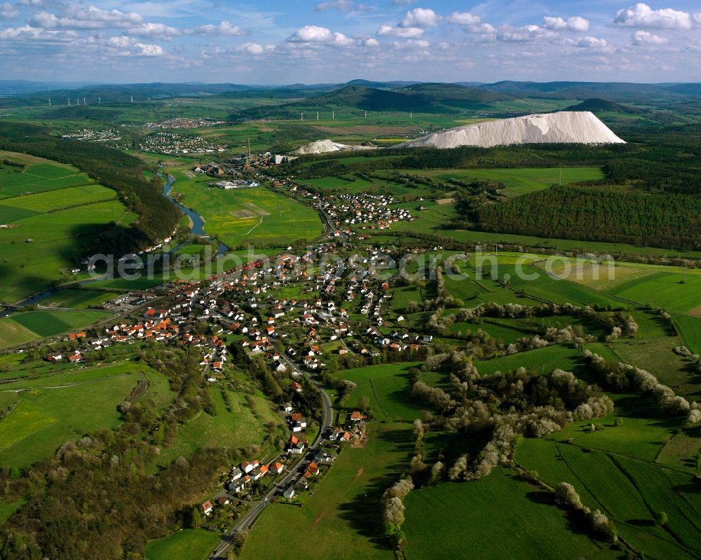 Heimboldshausen from above - Village view on the edge of agricultural fields and land in Heimboldshausen in the state Hesse, Germany