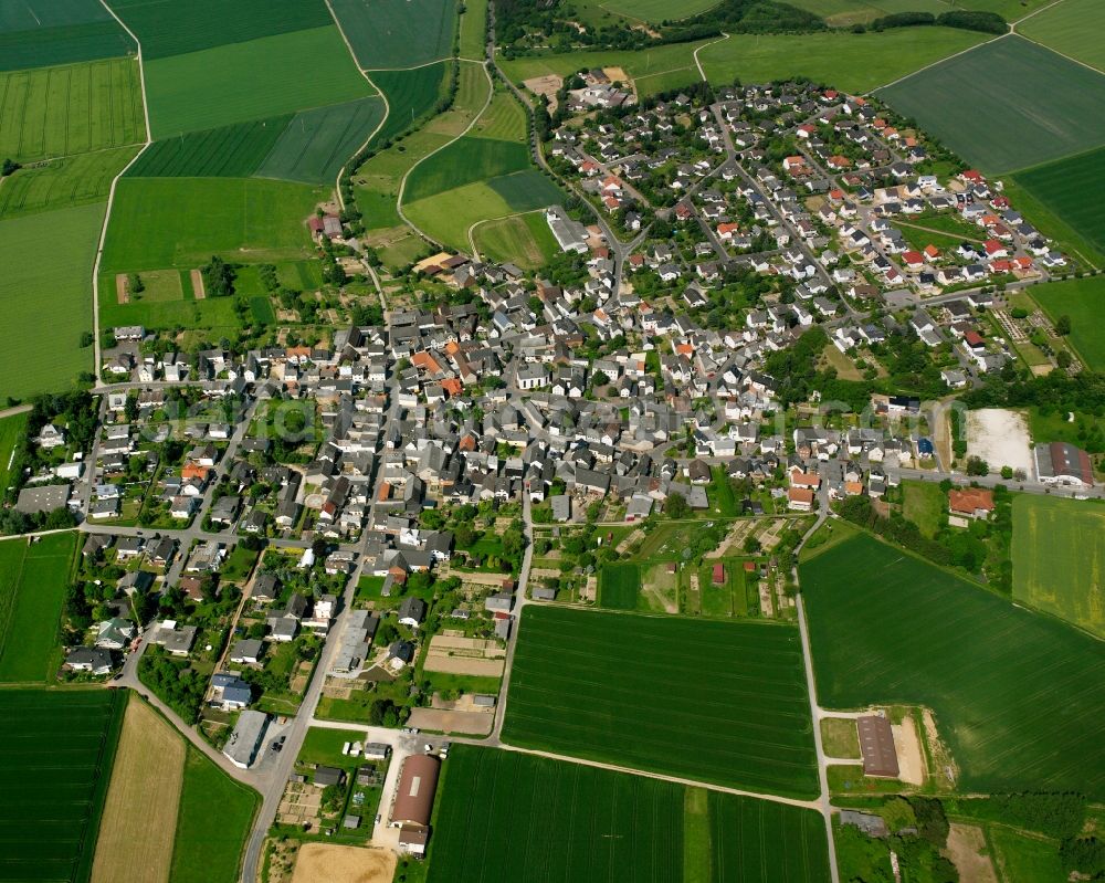 Heringen from above - Village view on the edge of agricultural fields and land in Heringen in the state Hesse, Germany