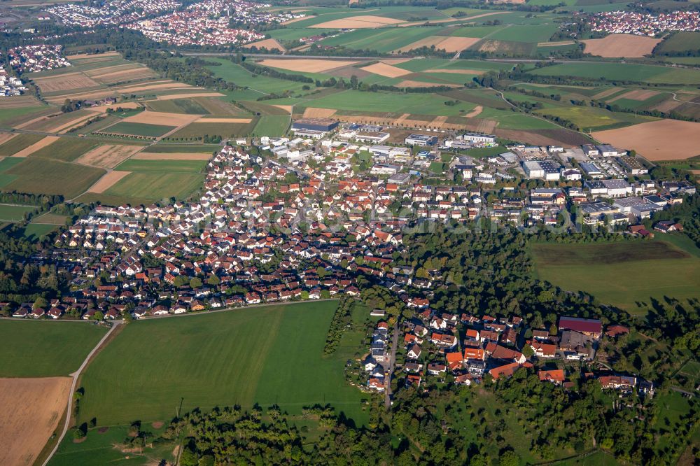 Aerial photograph Hertmannsweiler - Village view on the edge of agricultural fields and land on street Baacher Weg in Hertmannsweiler in the state Baden-Wuerttemberg, Germany