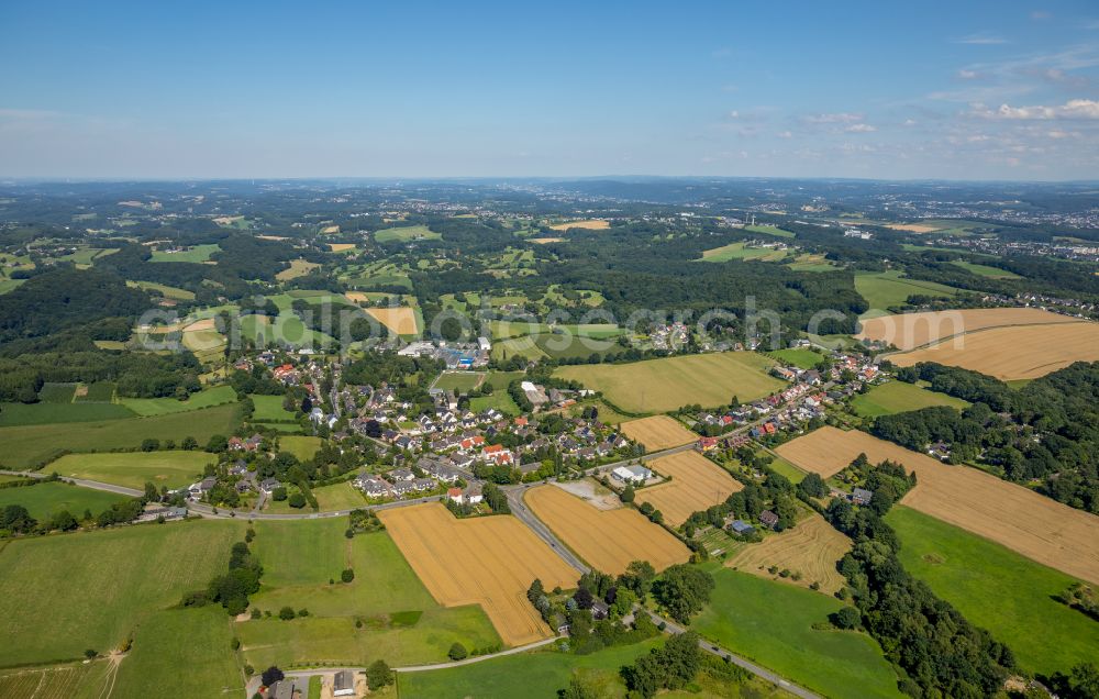 Aerial image Herzkamp - Village view on the edge of agricultural fields and land in Herzkamp in the state North Rhine-Westphalia, Germany