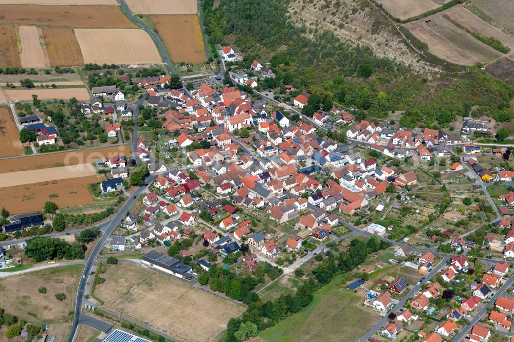 Heßdorf from the bird's eye view: Village view on the edge of agricultural fields and land in Heßdorf in the state Bavaria, Germany