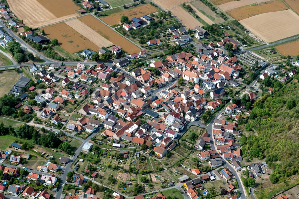 Aerial image Heßdorf - Village view on the edge of agricultural fields and land in Heßdorf in the state Bavaria, Germany