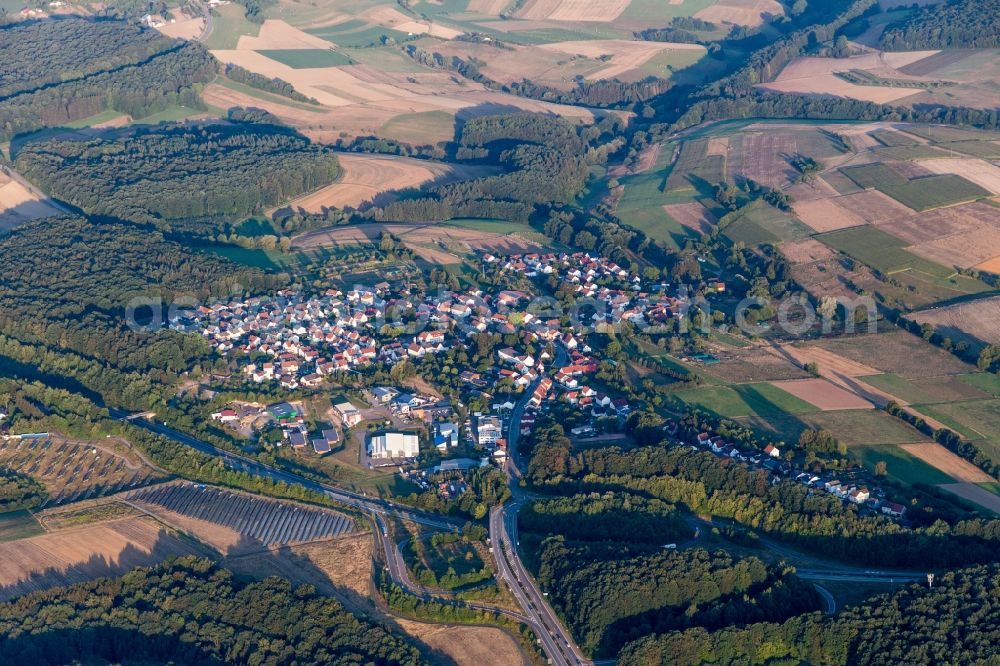 Höheischweiler from above - Village view on the edge of agricultural fields and land in Hoeheischweiler in the state Rhineland-Palatinate, Germany