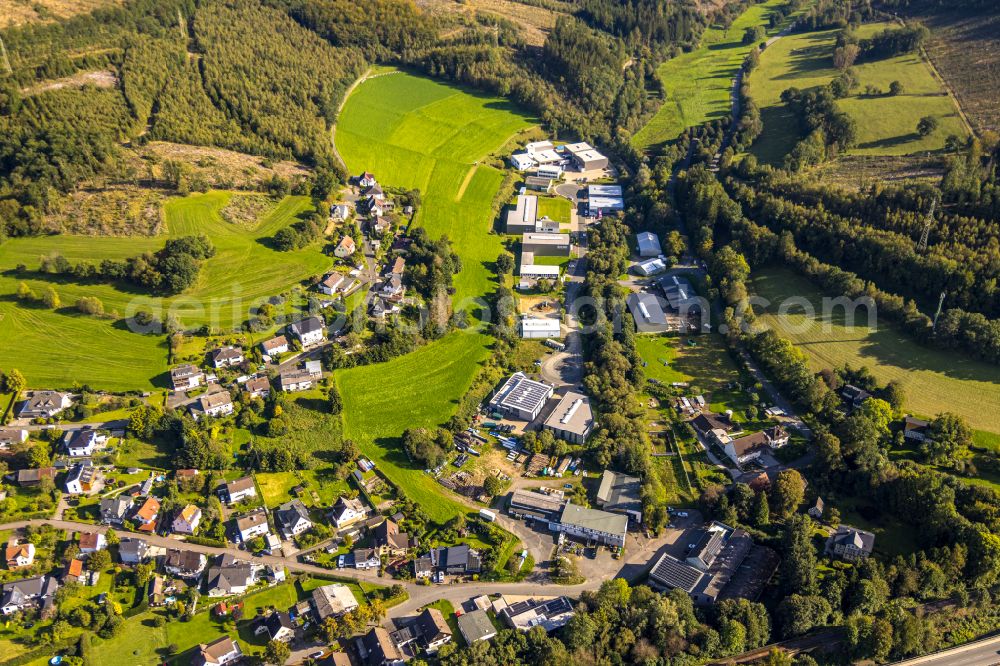 Aerial photograph Hilchenbach - Village view on the edge of agricultural fields and land in Hilchenbach at Siegerland in the state North Rhine-Westphalia, Germany