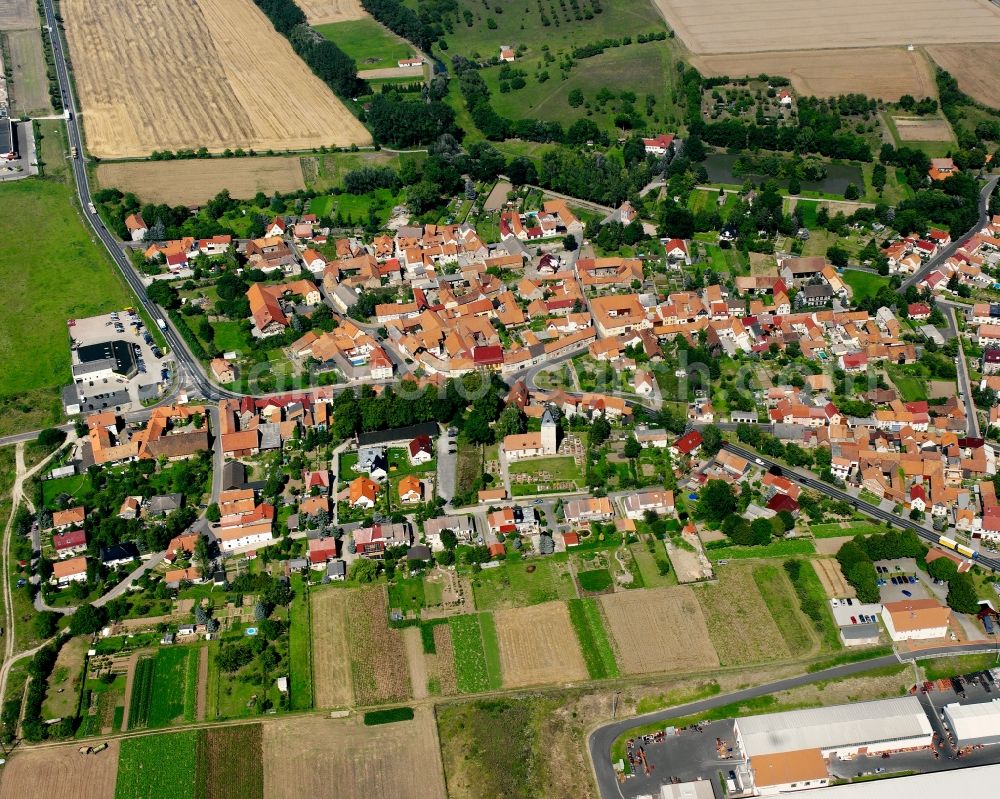 Aerial image Höngeda - Village view on the edge of agricultural fields and land in Höngeda in the state Thuringia, Germany