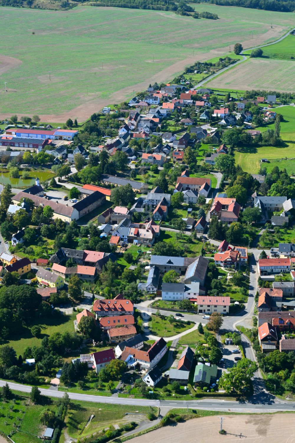 Aerial image Hohenölsen - Village view on the edge of agricultural fields and land in Hohenölsen in the state Thuringia, Germany