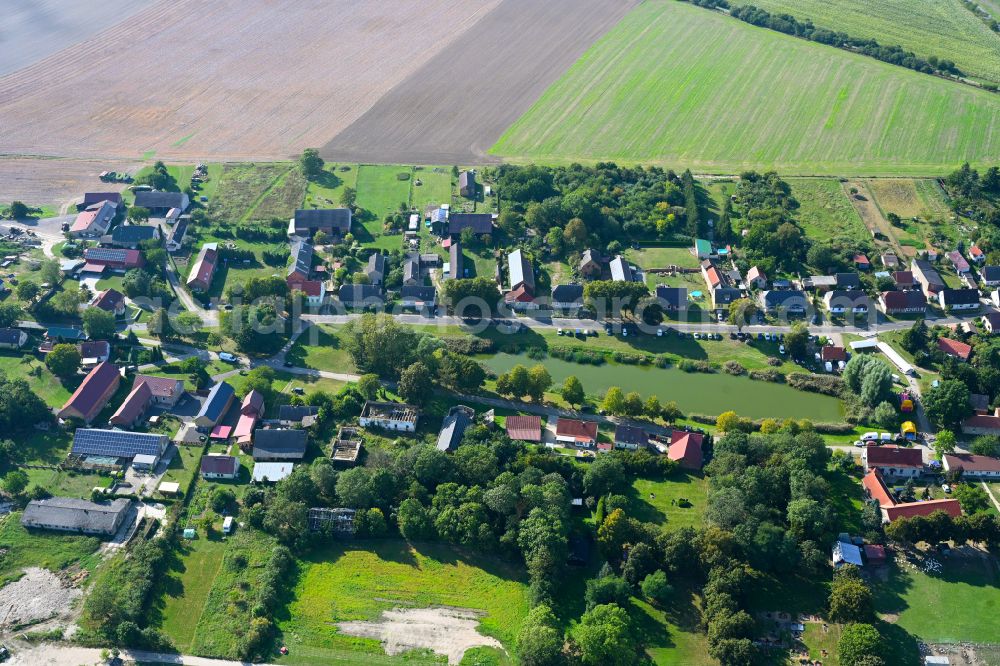 Aerial image Hohenreinkendorf - Village view on the edge of agricultural fields and land in Hohenreinkendorf in the state Brandenburg, Germany