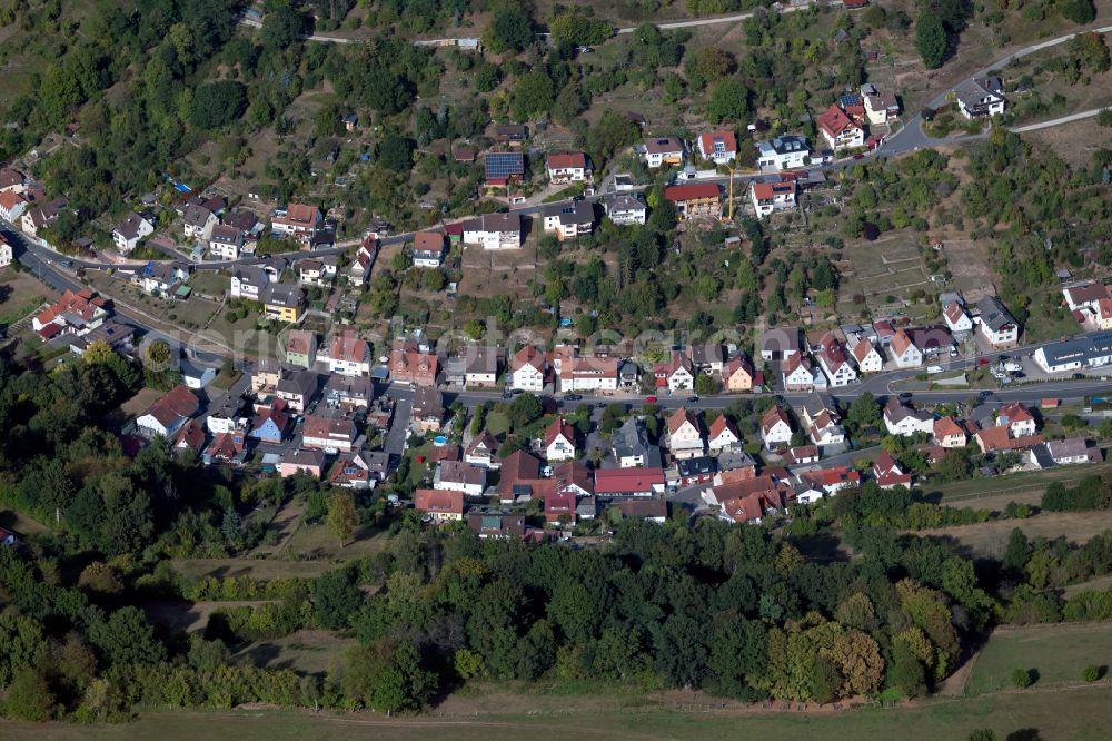 Hohenroth from above - Village view on the edge of agricultural fields and land in Hohenroth in the state Bavaria, Germany