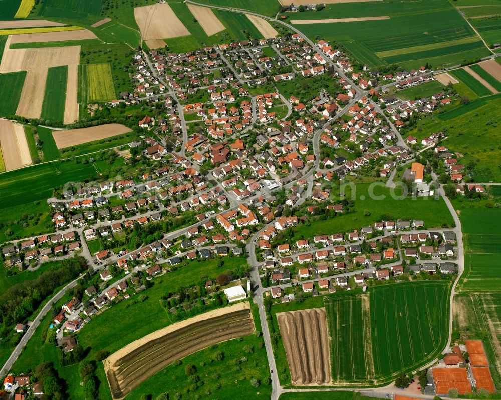 Holzhausen from above - Village view on the edge of agricultural fields and land in Holzhausen in the state Baden-Wuerttemberg, Germany