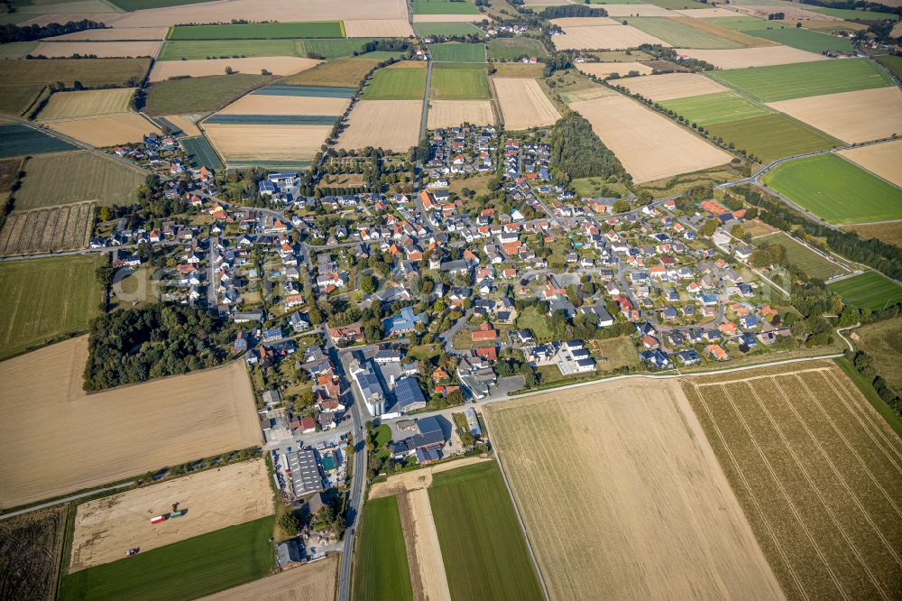 Aerial photograph Horn-Millinghausen - Village view on the edge of agricultural fields and land in Horn-Millinghausen in the state North Rhine-Westphalia, Germany