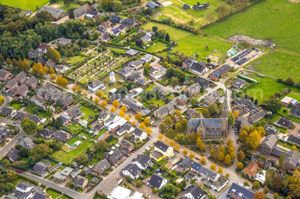 Hüthum from the bird's eye view: Village view on the edge of agricultural fields and land in Huethum in the state North Rhine-Westphalia, Germany