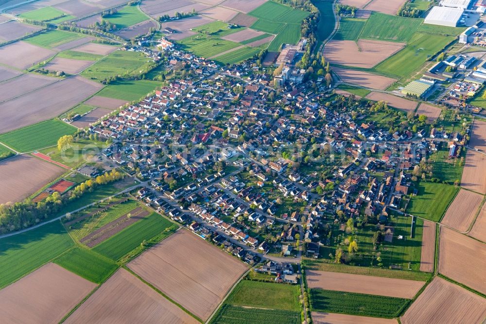 Aerial photograph Hugsweier - Village view on the edge of agricultural fields and land in Hugsweier in the state Baden-Wuerttemberg, Germany