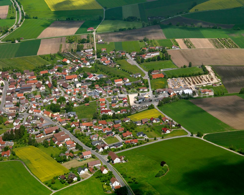 Ingerkingen from the bird's eye view: Village view on the edge of agricultural fields and land in Ingerkingen in the state Baden-Wuerttemberg, Germany