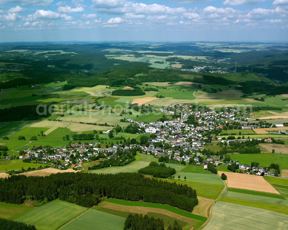 Issigau from above - Village view on the edge of agricultural fields and land in Issigau in the state Bavaria, Germany