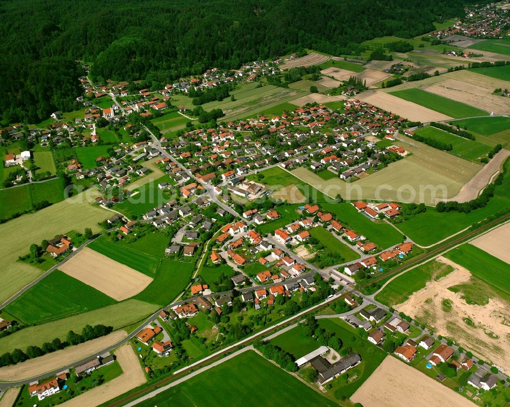 Aerial image Julbach - Village view on the edge of agricultural fields and land in Julbach in the state Bavaria, Germany