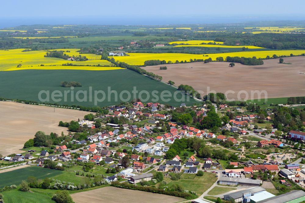 Kalkhorst from the bird's eye view: Village view on the edge of agricultural fields and land in Kalkhorst in the state Mecklenburg - Western Pomerania, Germany