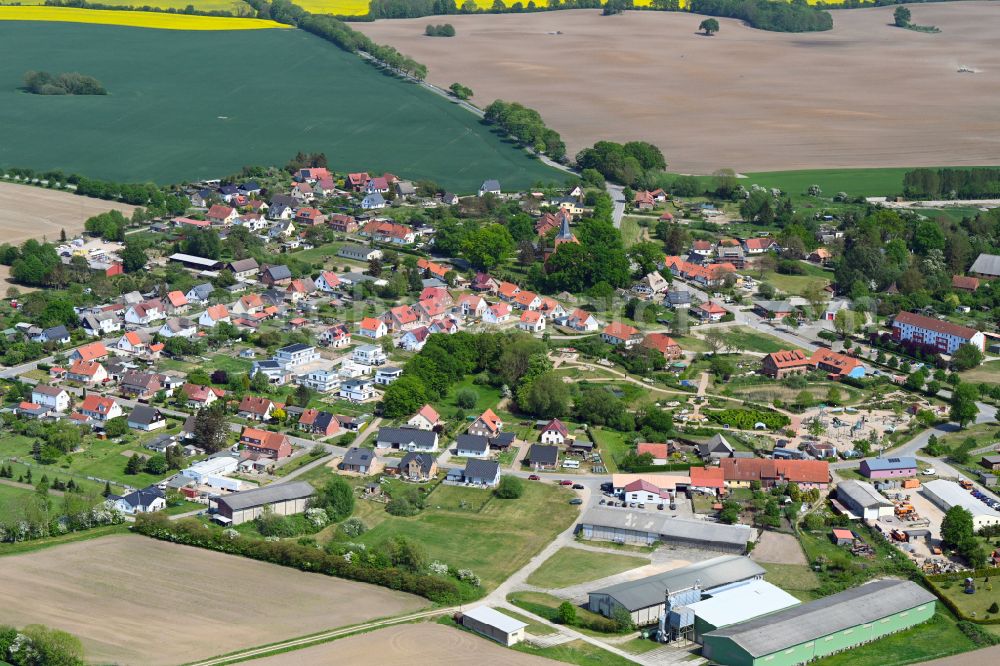 Aerial photograph Kalkhorst - Village view on the edge of agricultural fields and land in Kalkhorst in the state Mecklenburg - Western Pomerania, Germany