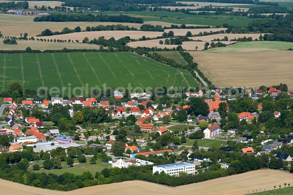 Aerial photograph Kalkhorst - Village view on the edge of agricultural fields and land in Kalkhorst in the state Mecklenburg - Western Pomerania, Germany