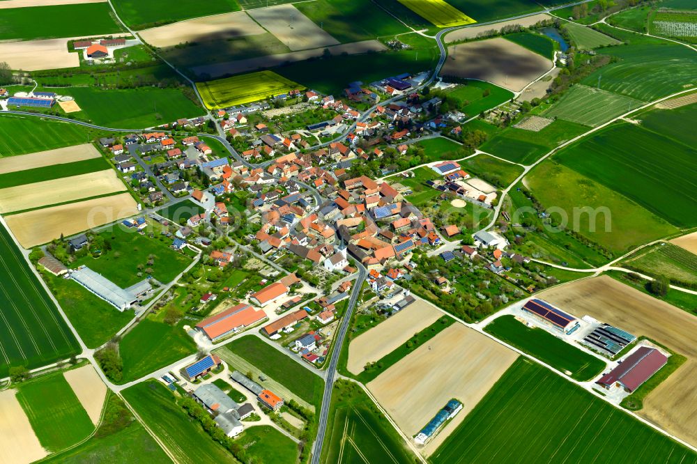 Aerial image Kaltensondheim - Village view on the edge of agricultural fields and land in Kaltensondheim in the state Bavaria, Germany