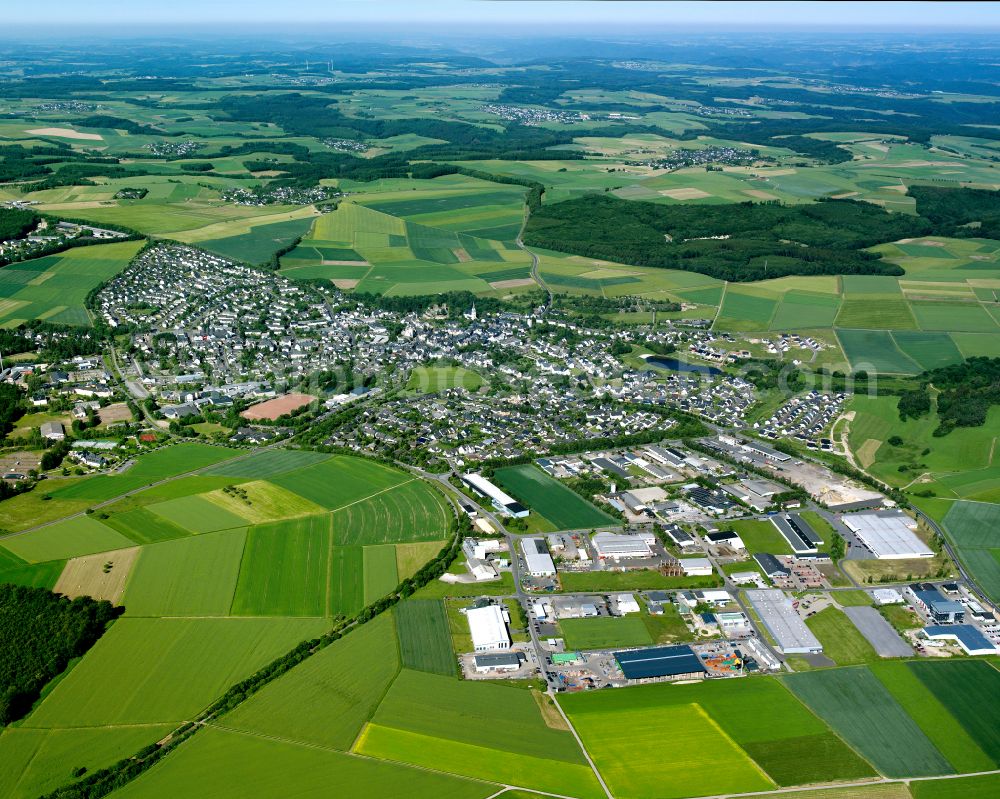 Aerial photograph Kastellaun - Village view on the edge of agricultural fields and land in Kastellaun in the state Rhineland-Palatinate, Germany