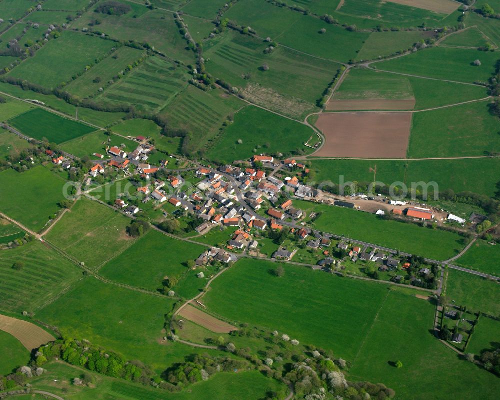 Aerial image Kaulstoß - Village view on the edge of agricultural fields and land in Kaulstoß in the state Hesse, Germany