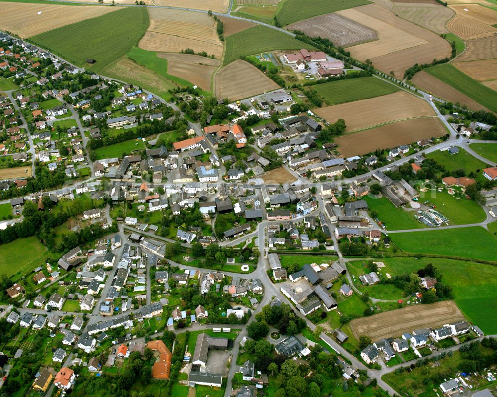 Köditz from the bird's eye view: Village view on the edge of agricultural fields and land in Köditz in the state Bavaria, Germany