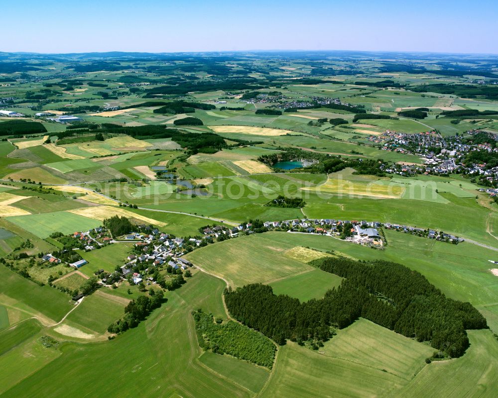 Aerial image Kienberg - Village view on the edge of agricultural fields and land in Kienberg in the state Bavaria, Germany