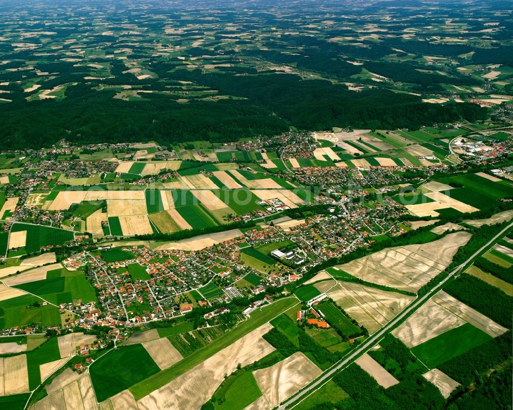 Kirchdorf am Inn from above - Village view on the edge of agricultural fields and land in Kirchdorf am Inn in the state Bavaria, Germany