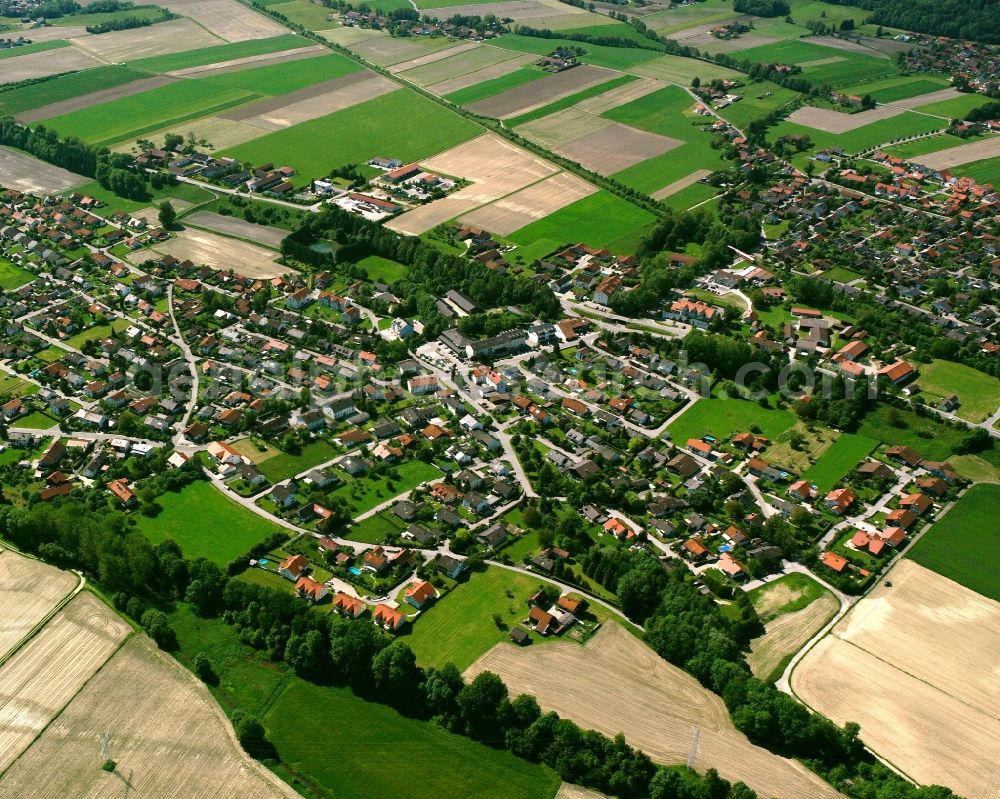 Kirchdorf am Inn from the bird's eye view: Village view on the edge of agricultural fields and land in Kirchdorf am Inn in the state Bavaria, Germany