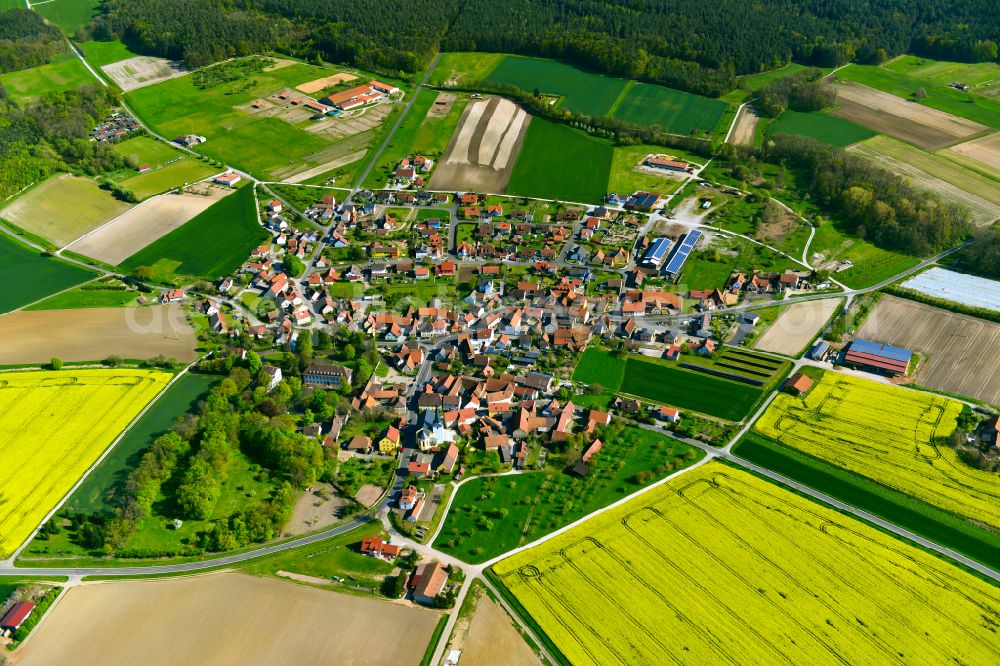 Kirchschönbach from above - Village view on the edge of agricultural fields and land in Kirchschönbach in the state Bavaria, Germany