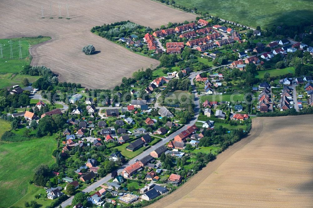 Klein Rogahn from above - Village view on the edge of agricultural fields and land in Klein Rogahn in the state Mecklenburg - Western Pomerania, Germany