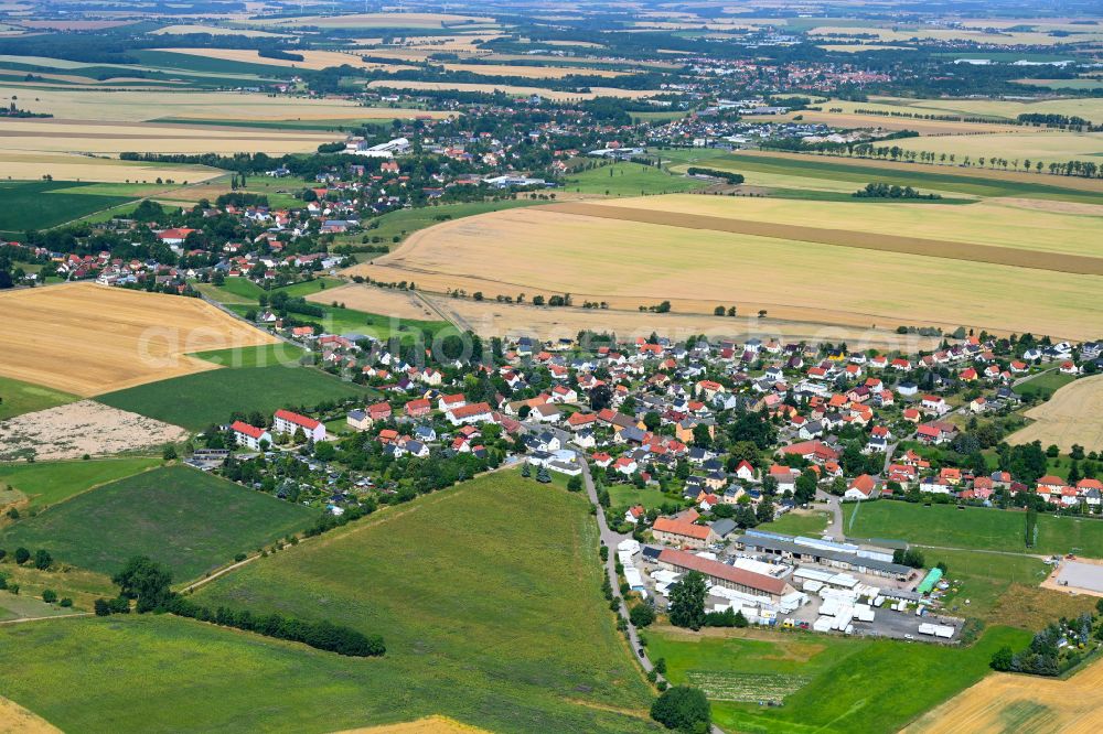 Aerial image Kleinopitz - Village view on the edge of agricultural fields and land in Kleinopitz in the state Saxony, Germany