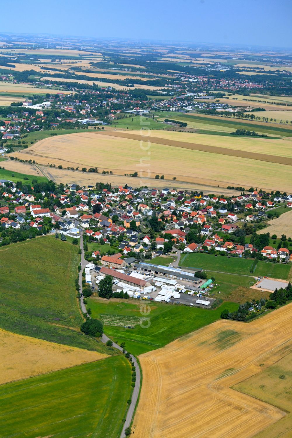 Aerial photograph Kleinopitz - Village view on the edge of agricultural fields and land in Kleinopitz in the state Saxony, Germany