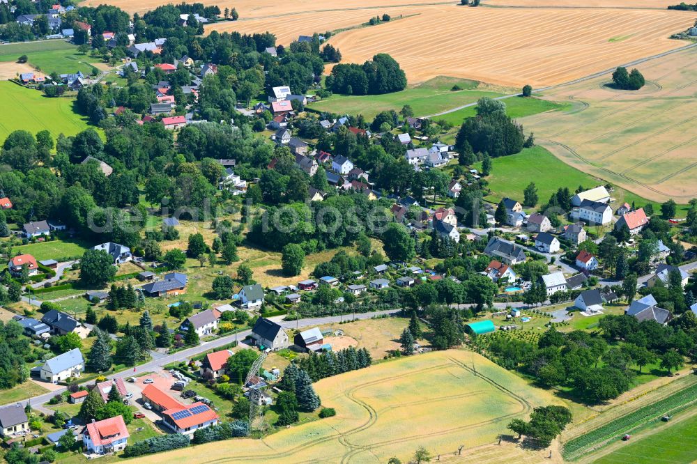 Kleinwaltersdorf from the bird's eye view: Village view on the edge of agricultural fields and land in Kleinwaltersdorf in the state Saxony, Germany