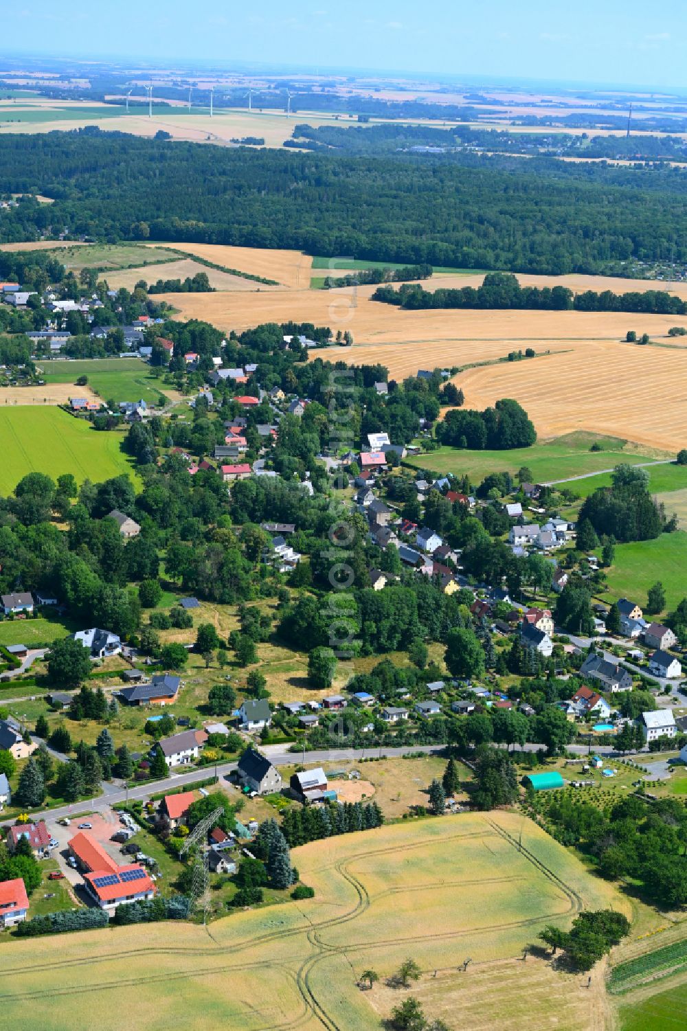 Aerial image Kleinwaltersdorf - Village view on the edge of agricultural fields and land in Kleinwaltersdorf in the state Saxony, Germany