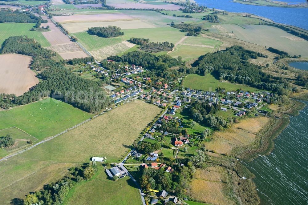 Aerial photograph Lütow - Village view on the edge of agricultural fields and land on Kueste of Ostsee in Luetow in the state Mecklenburg - Western Pomerania, Germany